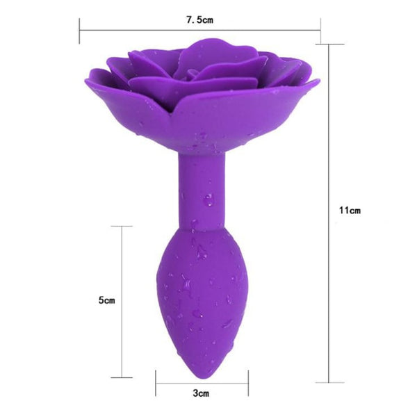 Purple silicone rose-shaped butt plug shown upright with measurement lines