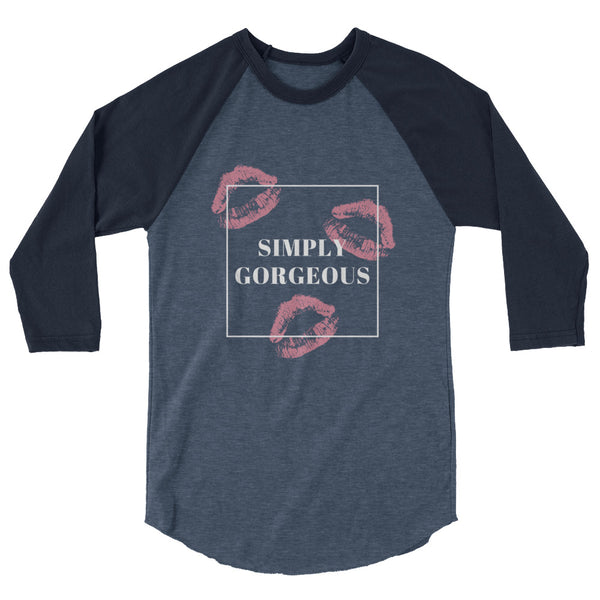 Front view of a navy and charcoal raglan shirt reading “SIMPLY GORGEOUS” with pink lips