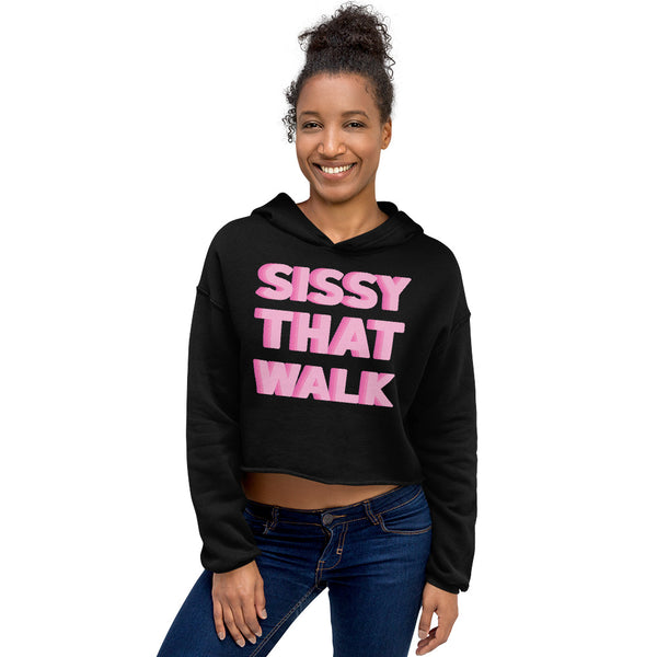 Model wearing a black cropped hoodie with pink “SISSY THAT WALK” lettering