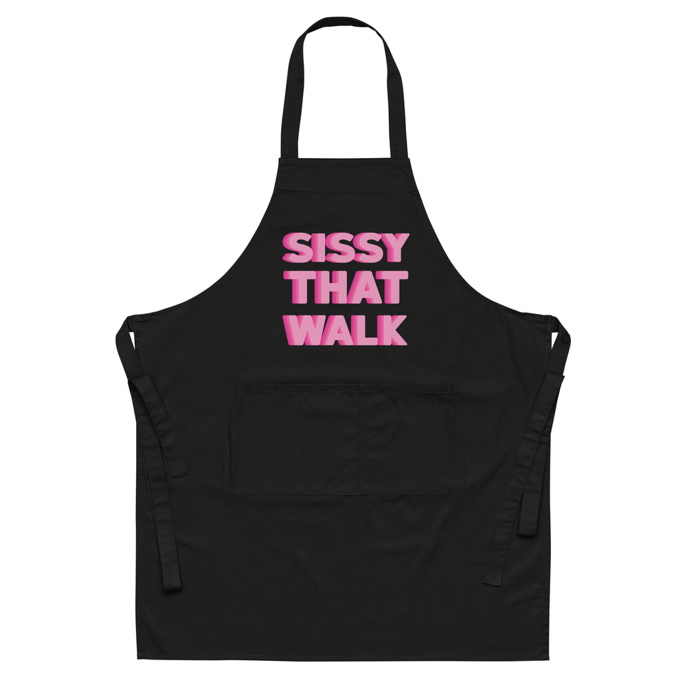 Front-facing black apron with pink “SISSY THAT WALK” lettering and a divided front pocket