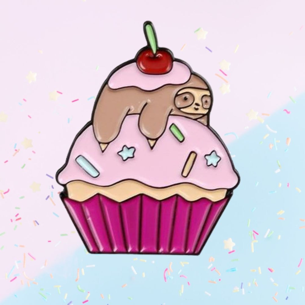 Sloth cupcake enamel pin design with pink frosting, cherry, sprinkles, and magenta wrapper