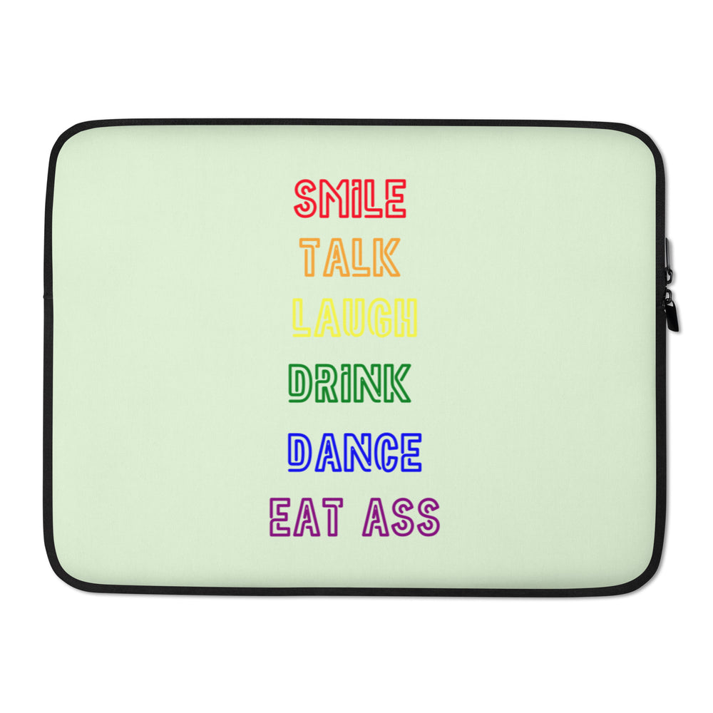 Front view of a pale green laptop sleeve reading “SMILE TALK LAUGH DRINK DANCE EAT ASS”