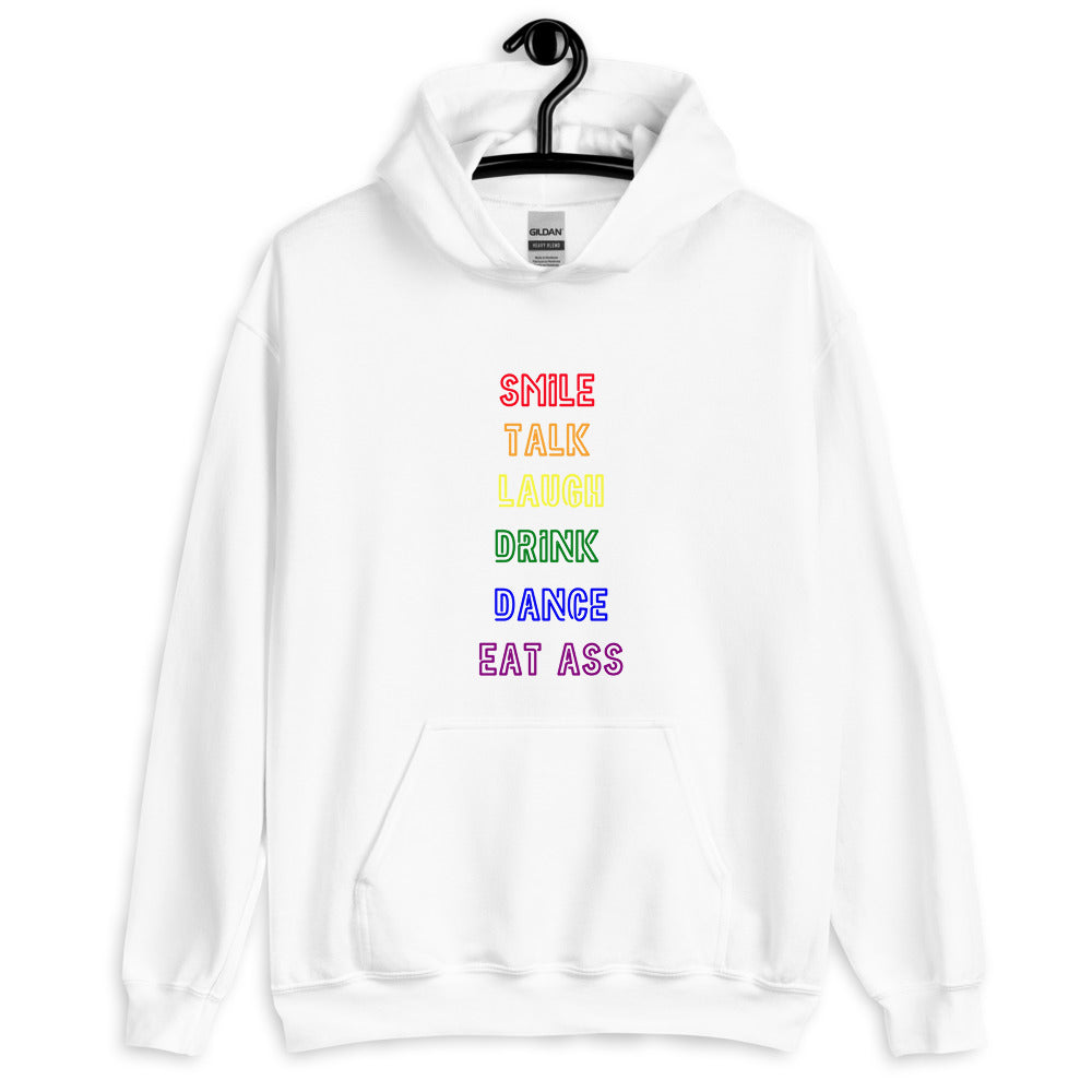 Front view of a white hoodie reading “SMILE TALK LAUGH DRINK DANCE EAT ASS” in rainbow letters