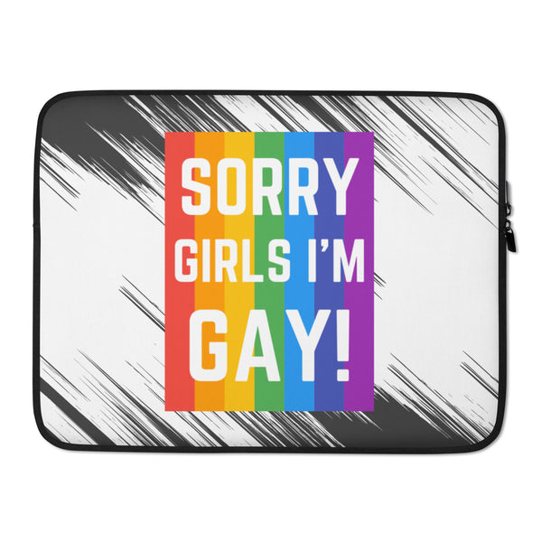 Laptop sleeve with rainbow stripes reading “SORRY GIRLS I’M GAY!” on a black-and-white streaked background