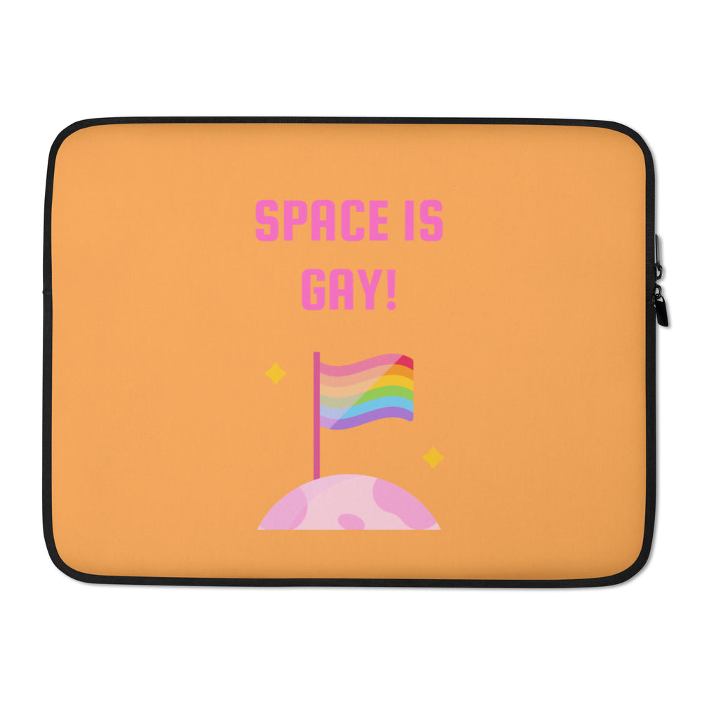 Orange laptop sleeve with pink “SPACE IS GAY!” text, rainbow flag, and moon graphic