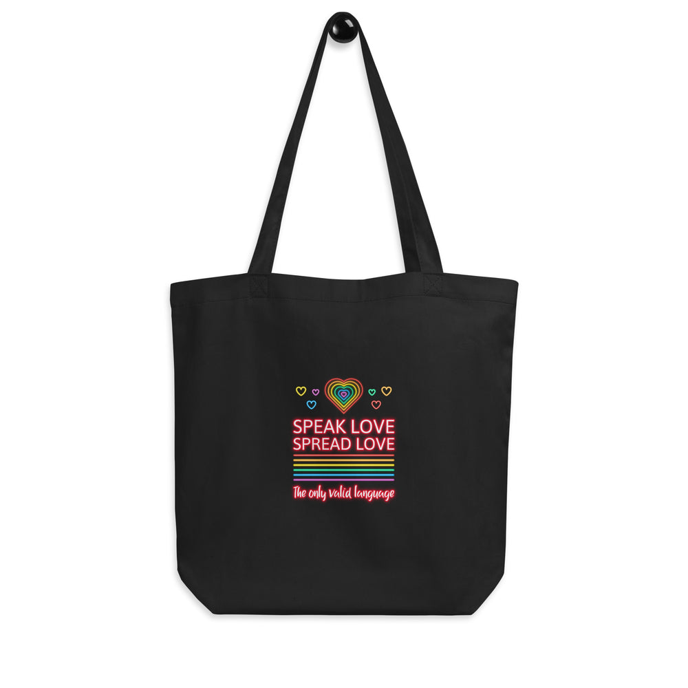 Front-facing black tote bag with rainbow hearts and “Speak Love Spread Love” text