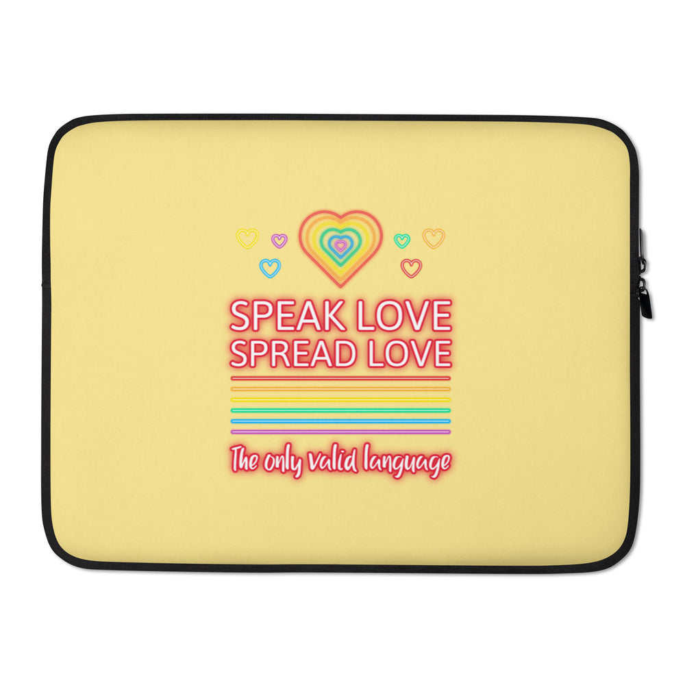 Yellow laptop sleeve with rainbow hearts and the words “SPEAK LOVE SPREAD LOVE”