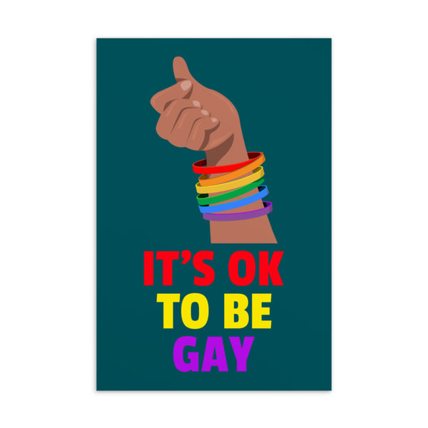 “IT’S OK TO BE GAY” postcard with a raised hand wearing rainbow bracelets