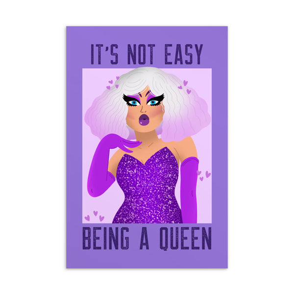 Postcard reading “IT’S NOT EASY BEING A QUEEN” with a glamorous purple drag queen illustration