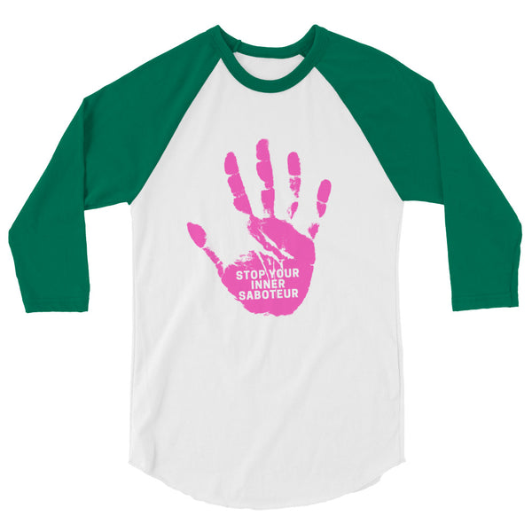 Front view of a white and green raglan shirt with a pink handprint reading “STOP YOUR INNER SABOTEUR”