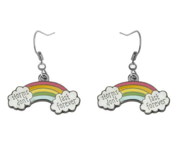 Rainbow earrings with cloud charms reading “storms don’t” and “last forever”