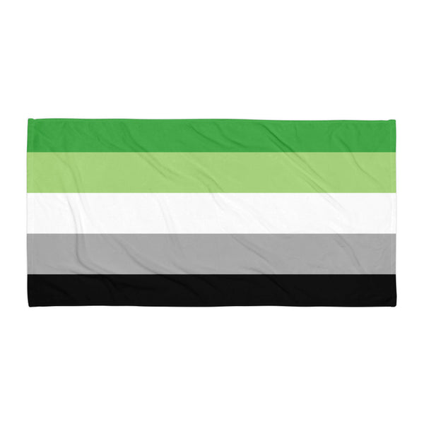 Flat-lay towel with horizontal green, light green, white, gray, and black stripes