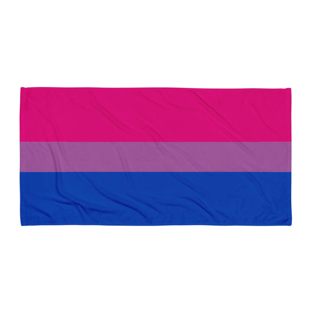 Flat-lay rectangular towel with pink, purple, and blue horizontal stripes