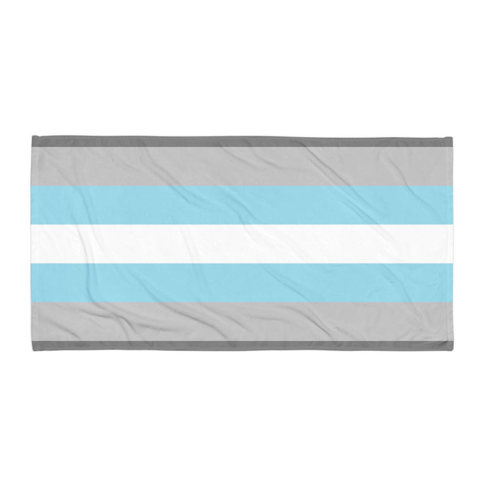 Flat rectangular towel displaying horizontal gray, light blue, and white stripes