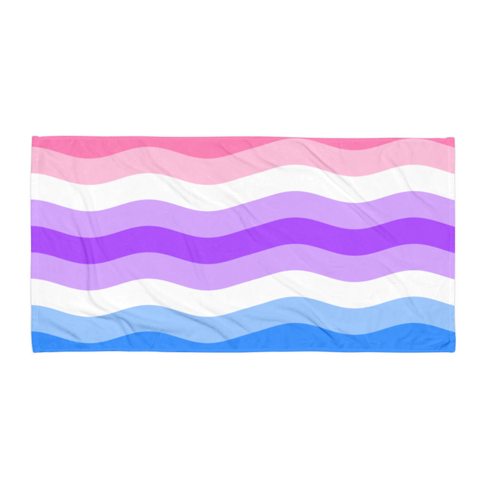 Flat-lay towel with wavy pink, white, purple, and blue stripes
