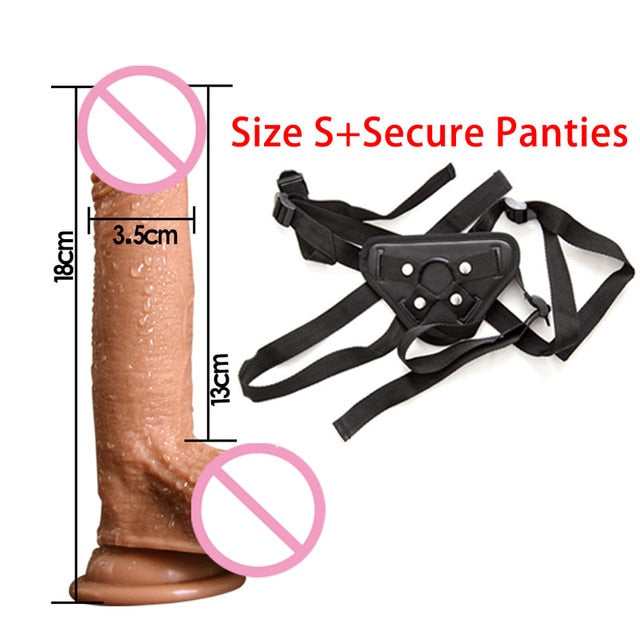Size diagram of a realistic textured dildo beside a black adjustable strap-on harness
