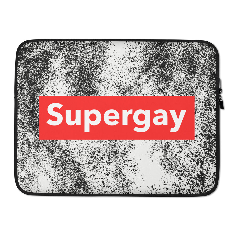 Laptop sleeve with black-and-white speckled design, red panel reading “Supergay,” and side zipper