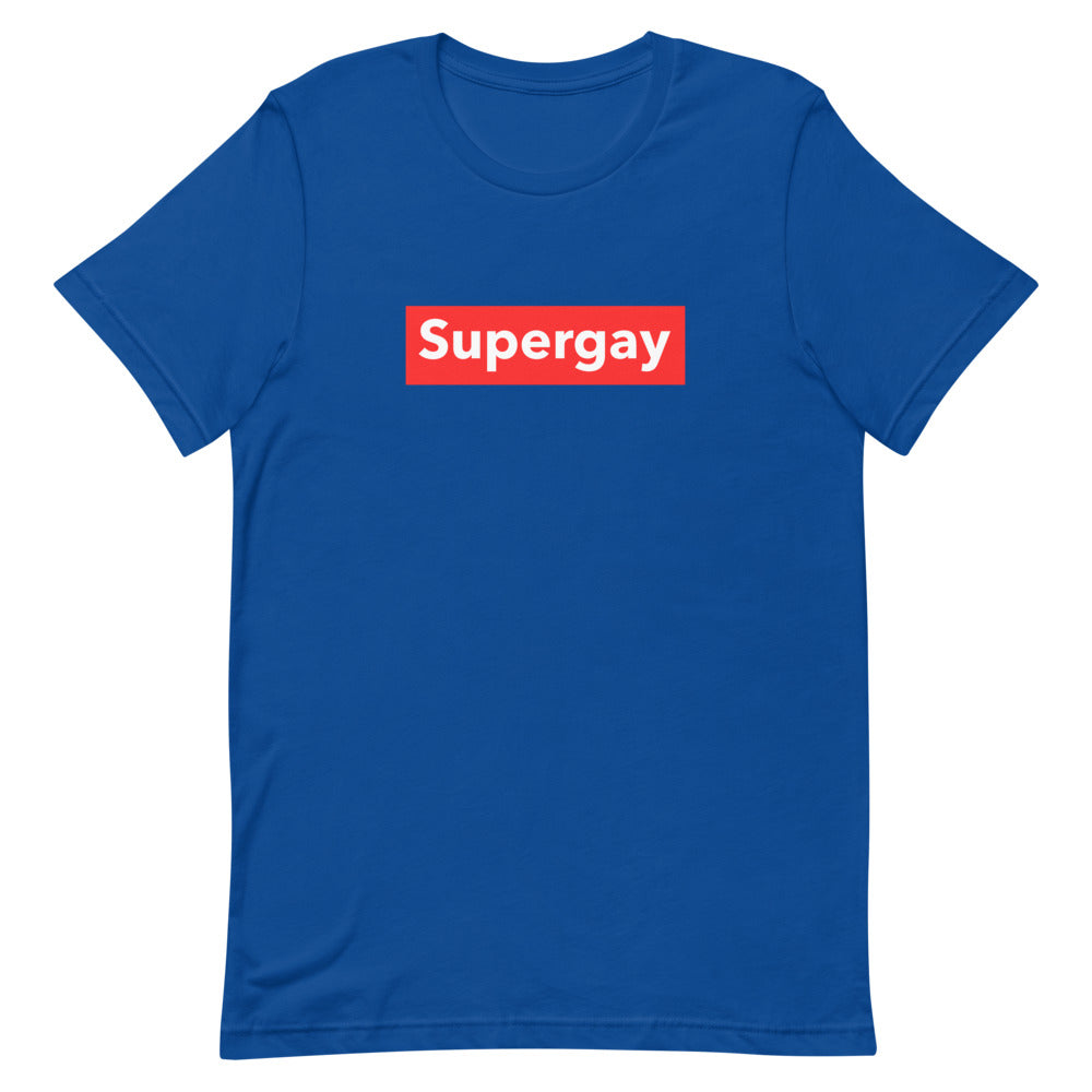Blue T-shirt with a red rectangular chest graphic reading “Supergay”
