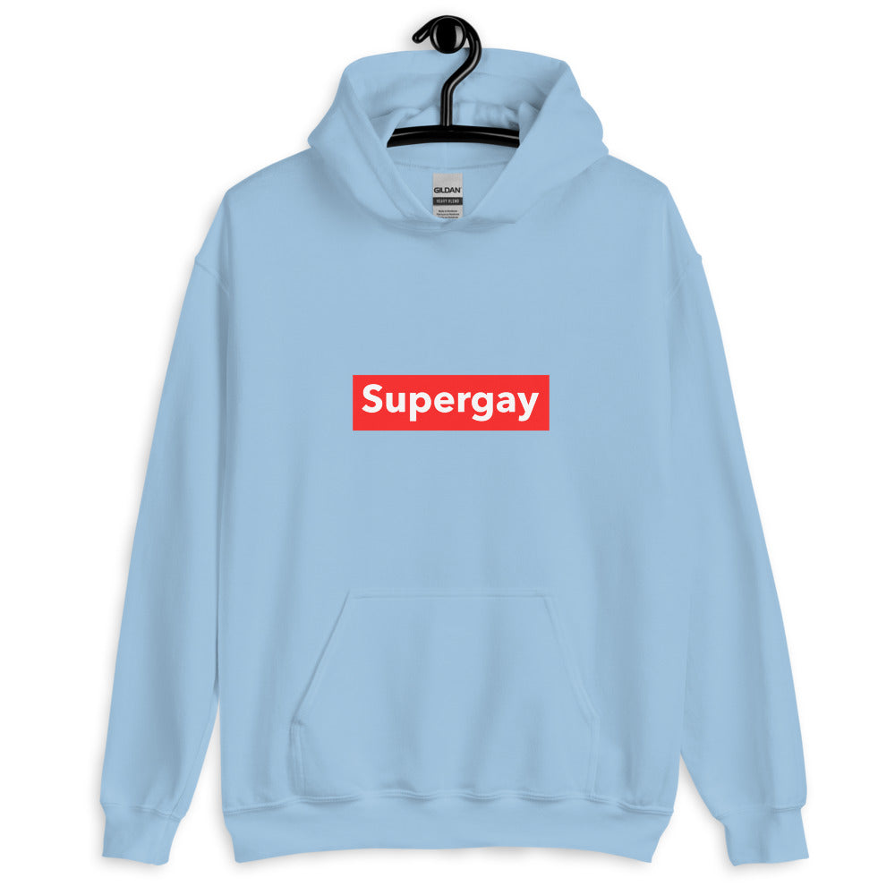Front-view light blue hoodie on a hanger with a red-and-white “Supergay” chest graphic