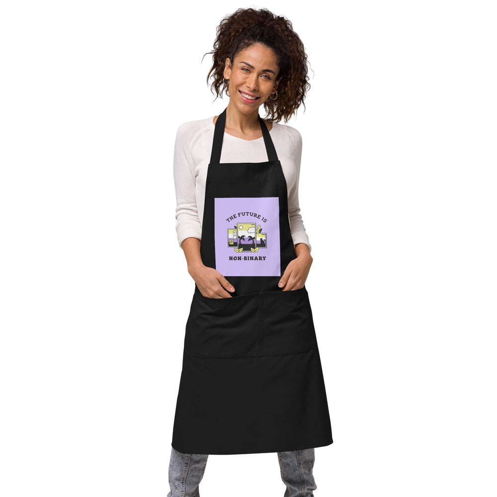 Front-view model wearing a black apron with a lavender panel reading “THE FUTURE IS NON-BINARY.”