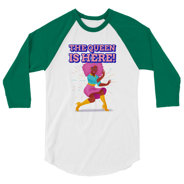 Front view of a white and green raglan shirt reading “THE QUEEN IS HERE!”