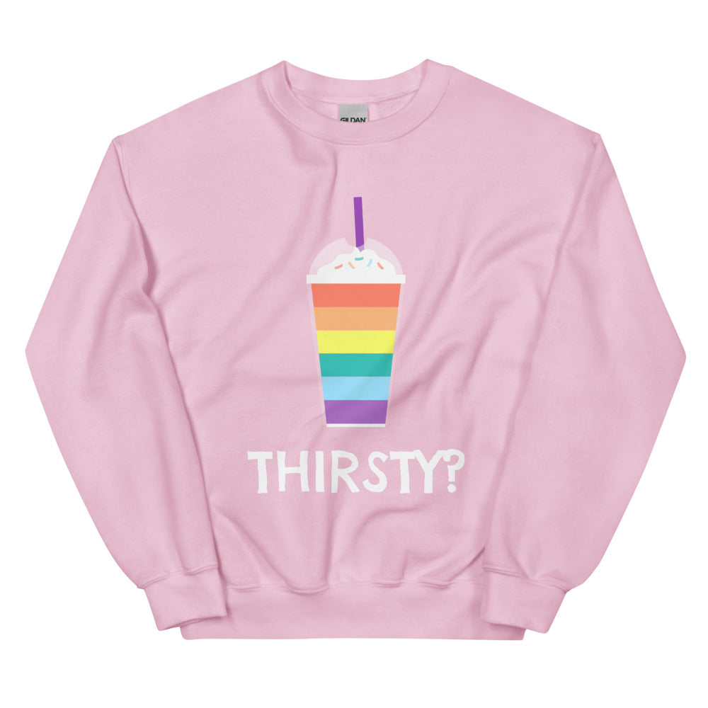 Front view of a pink sweatshirt with a rainbow-striped drink graphic and “THIRSTY?” text
