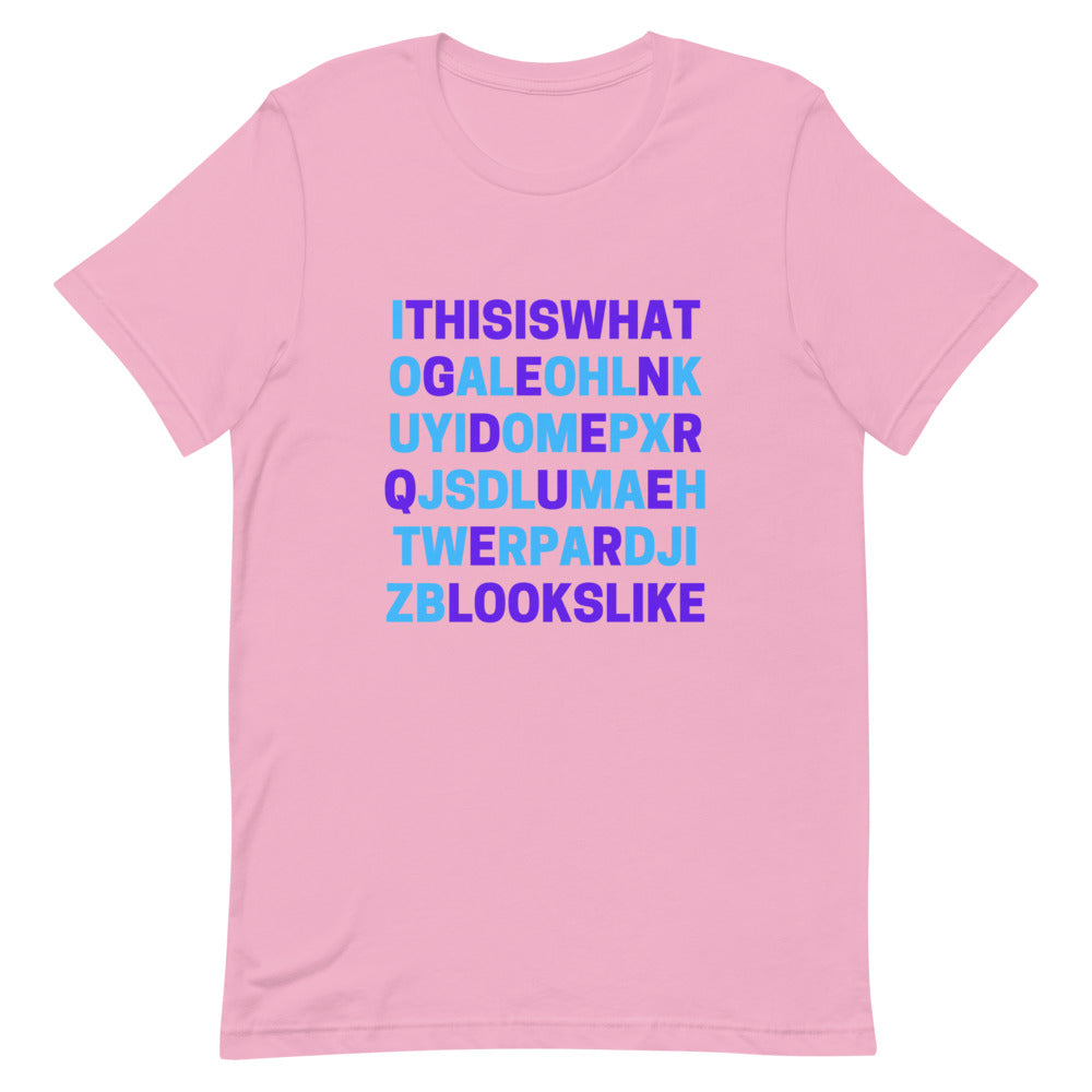 Pink T-shirt with bold blue and purple text reading “This is what ... looks like”