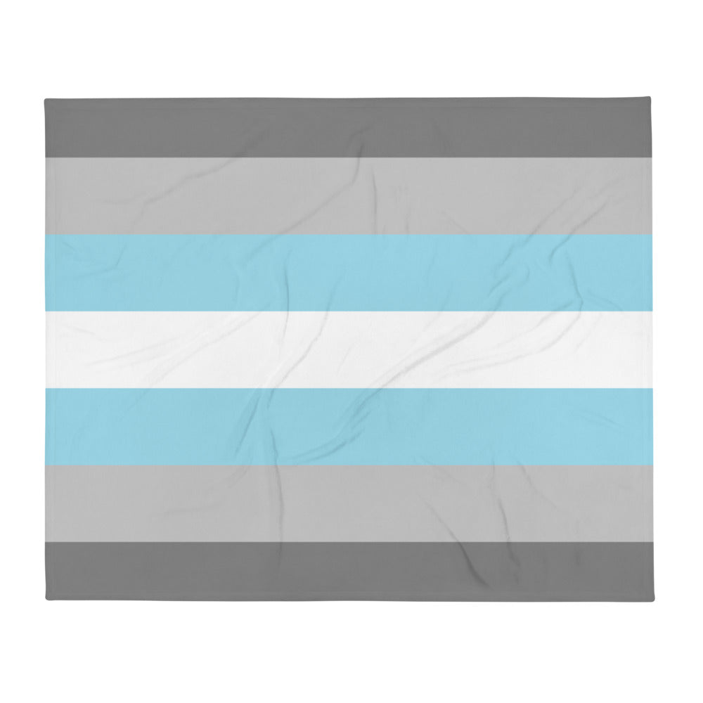 Flat-lay throw blanket with horizontal gray, light blue, and white stripes