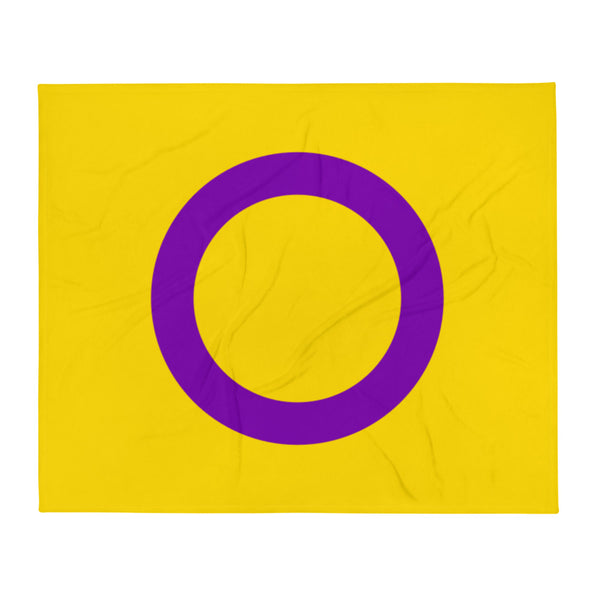 Front-facing yellow throw blanket with a large purple ring symbol