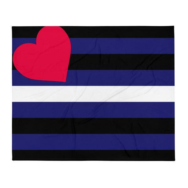 Flat-lay throw blanket with black and blue stripes, a white stripe, and a red heart