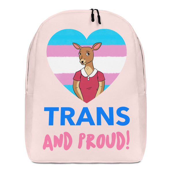 Front view of a pale pink backpack reading “TRANS AND PROUD!” with a kangaroo in a trans-flag heart