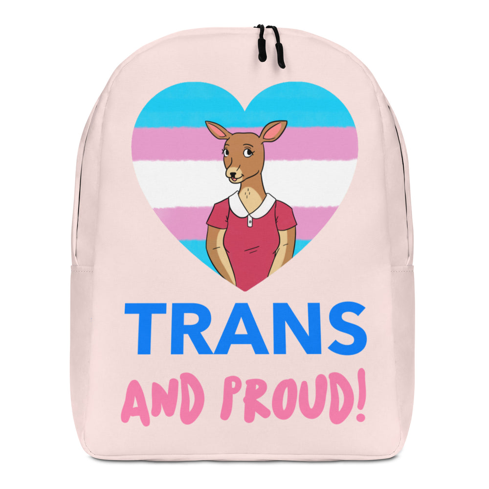 Front view of a pale pink backpack reading “TRANS AND PROUD!” with a kangaroo in a trans-flag heart