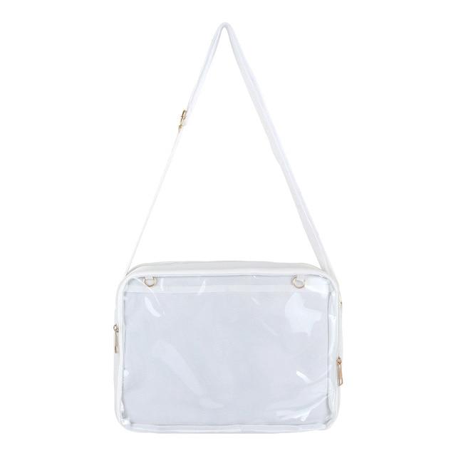 Close-up of a clear vinyl shoulder bag with a transparent front pin-display pocket