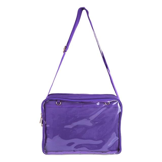 Purple transparent shoulder bag with a clear front pocket for displaying pins