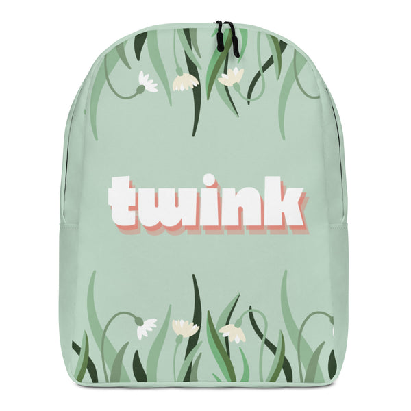 Front view of a mint-green floral backpack with “twink” in white and coral lettering