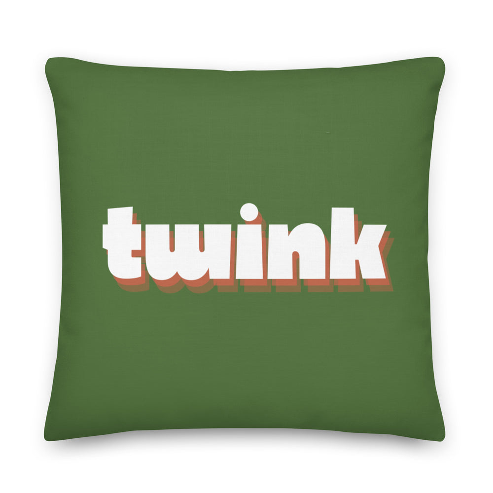 twinks in tights: Twink Pillow in bold green with “twink” text sits on a cushioned bench, yellow and navy pillows, blue &