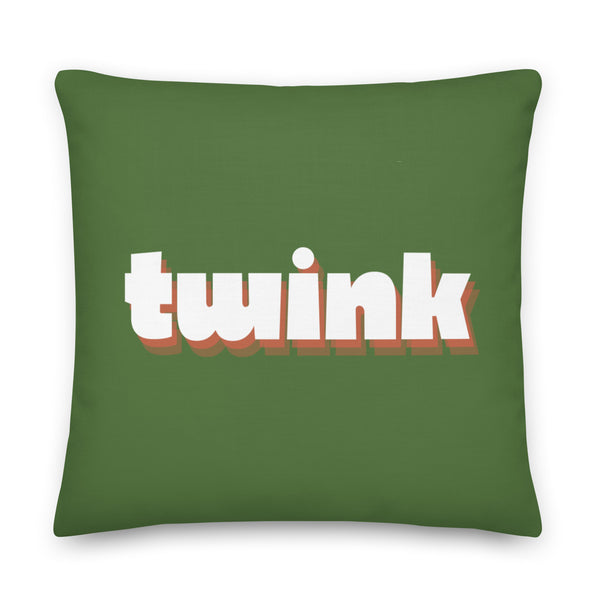 twinks in tights: Twink Pillow in bold green with “twink” text sits on a cushioned bench, yellow and navy pillows, blue &