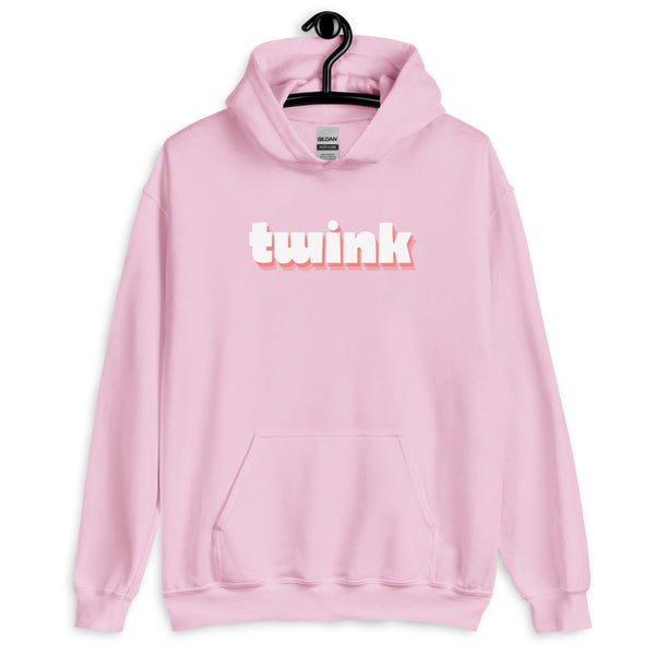 Front view of a light pink pullover hoodie with white-and-pink “twink” text