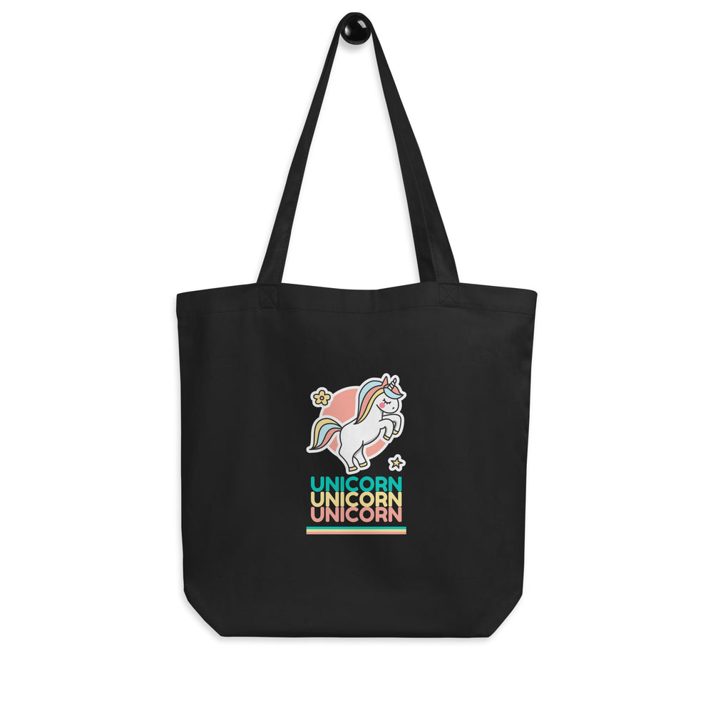 Black tote bag with a colorful rearing unicorn and “UNICORN” repeated three times