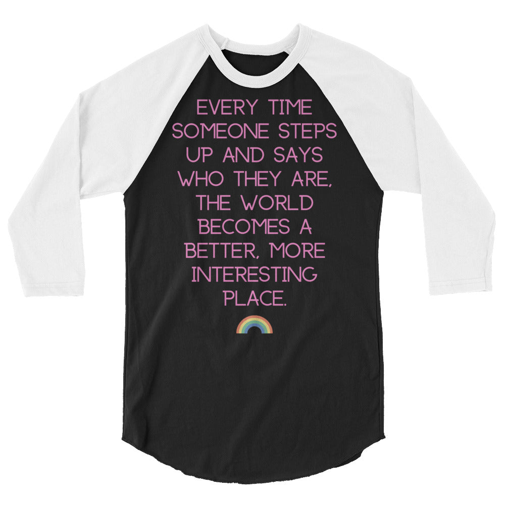 Front view of a black-and-white raglan shirt with pink text and a rainbow graphic