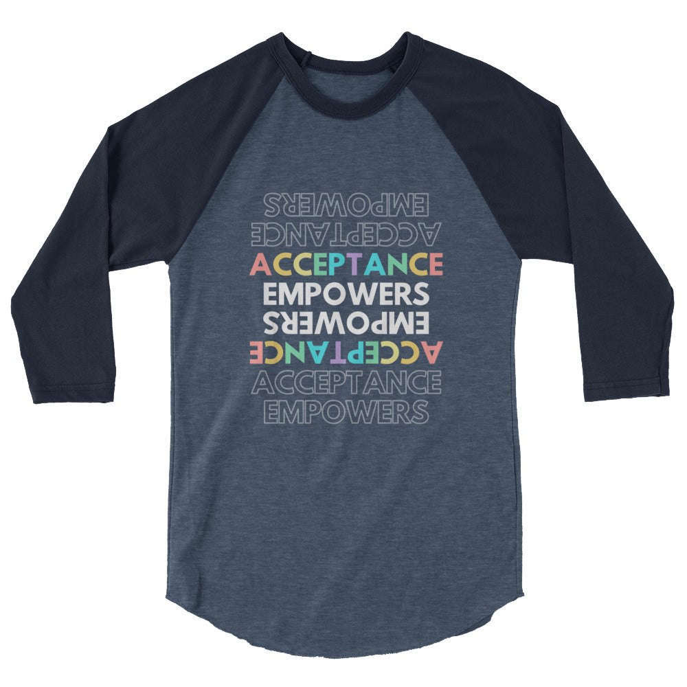 Front view of a charcoal raglan shirt with colorful “ACCEPTANCE EMPOWERS” text