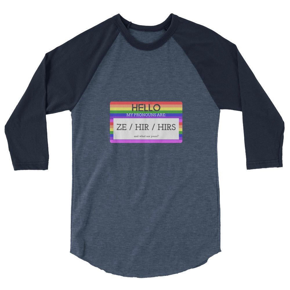 Front view of a navy and gray raglan shirt reading “HELLO” and “ZE / HIR / HIRS.”