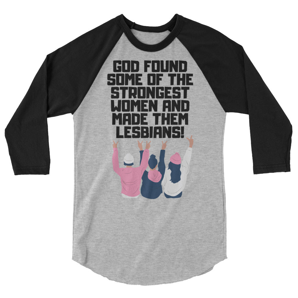 Front view of a gray and black raglan shirt reading “God found some of the strongest women and made them lesbians!”
