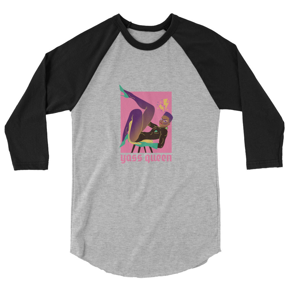 Gray and black raglan shirt with colorful seated figure graphic and “Yass Queen” text