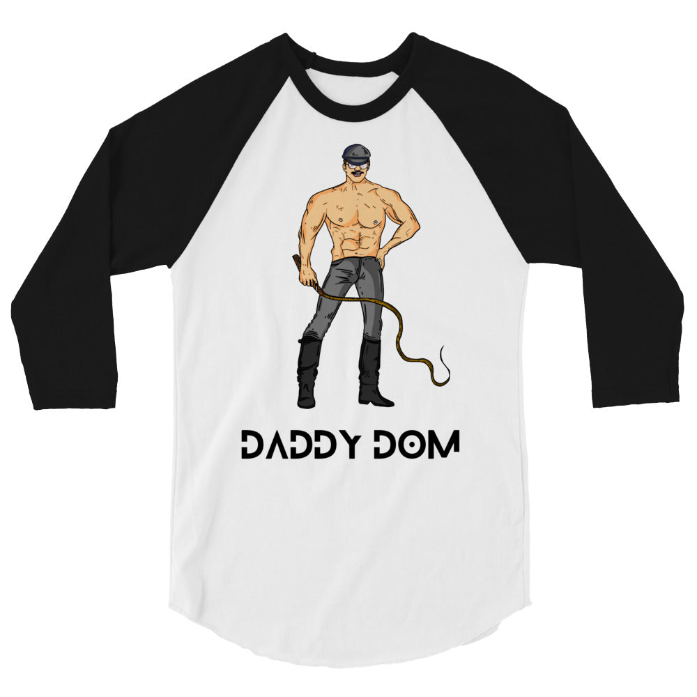 Front view of a white raglan shirt with black sleeves, featuring a leather-clad man and “DADDY DOM” text