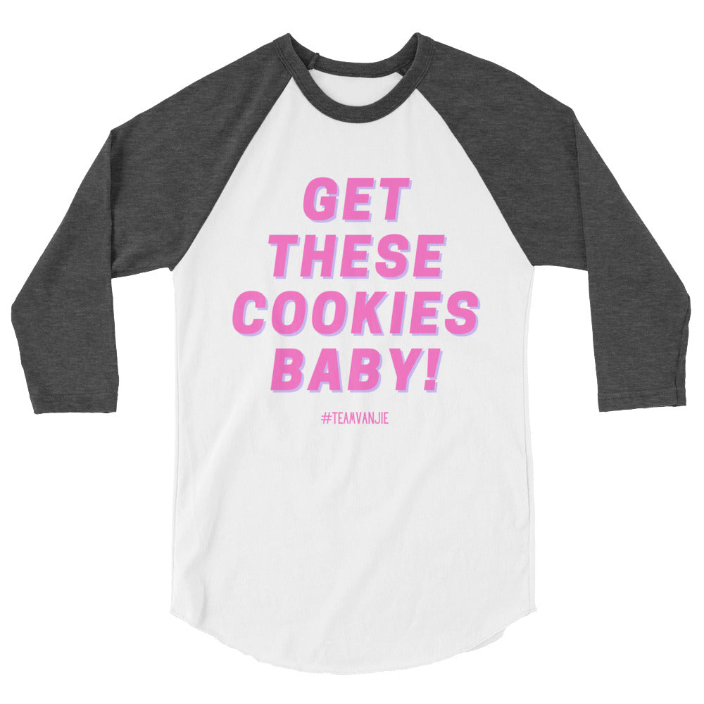 Front view of a white raglan shirt with dark gray sleeves reading “GET THESE COOKIES BABY!”