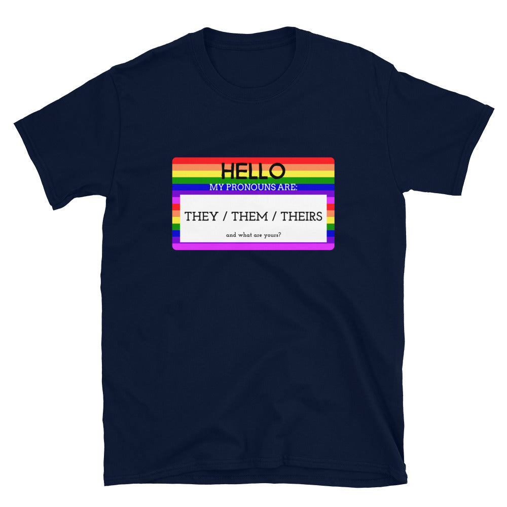 Navy T-shirt with rainbow-bordered pronoun graphic reading “They / Them / Theirs”