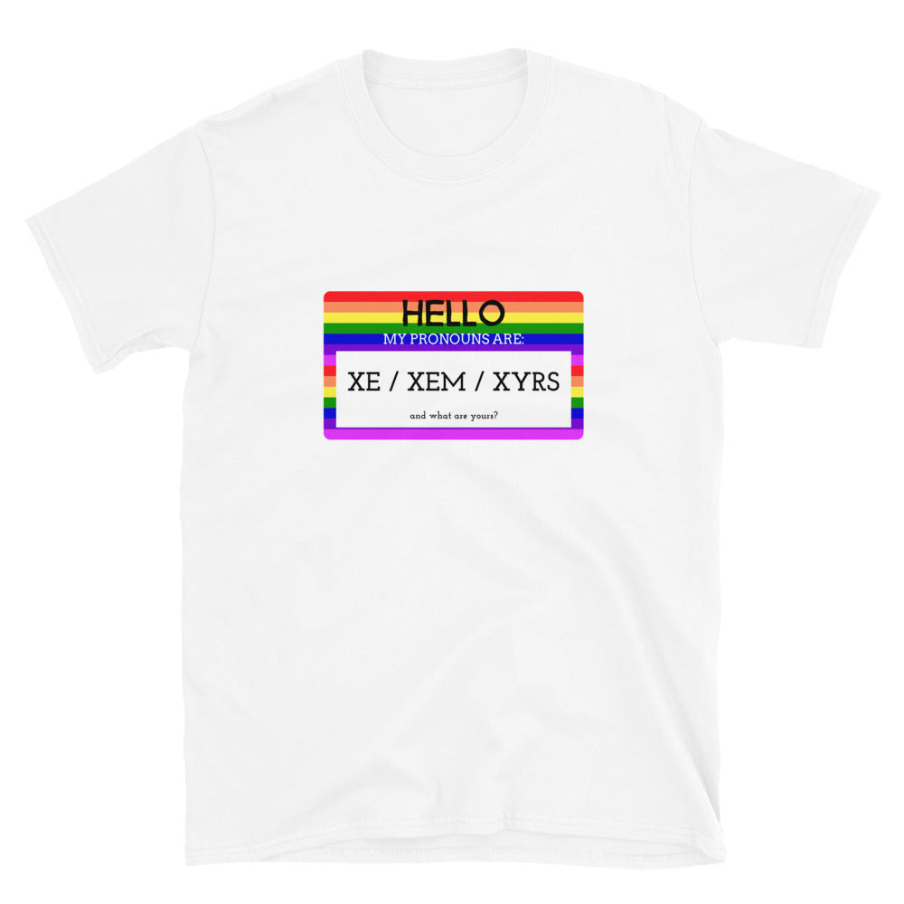 White T-shirt with rainbow-bordered “Hello, my pronouns are Xe / Xem / Xyrs” graphic
