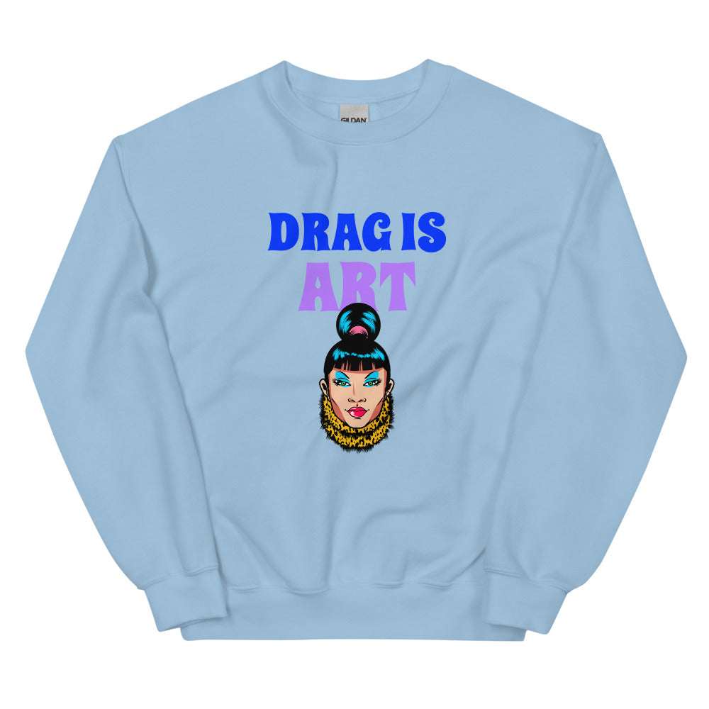 Front-facing light blue sweatshirt reading “DRAG IS ART,” with a colorful drag performer graphic