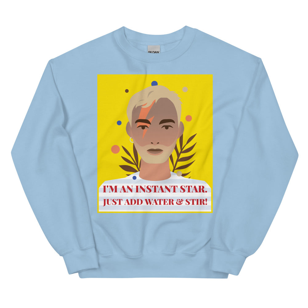 Light blue sweatshirt with a colorful portrait and “I'M AN INSTANT STAR” graphic
